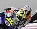  Rossi-Pedrosa-Capirossi in azione  